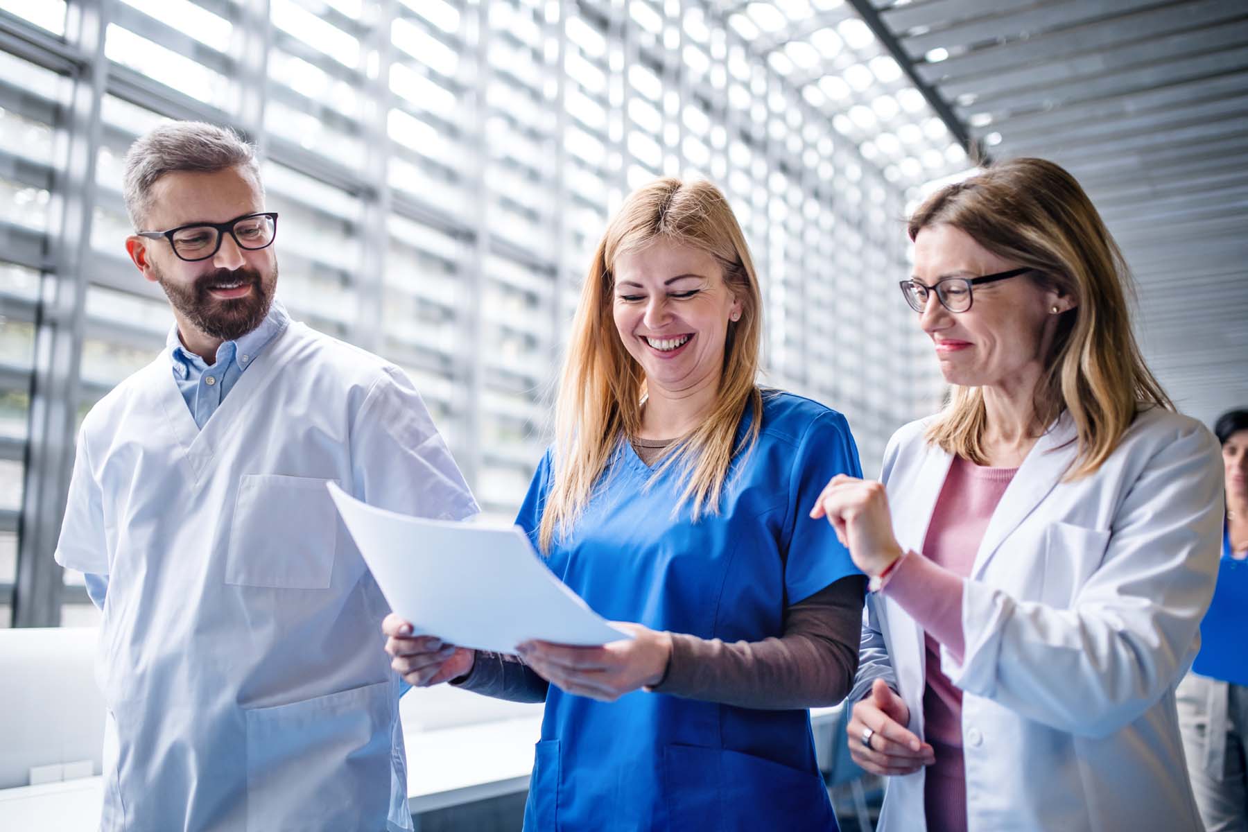 group-of-doctors-walking-in-corridor-on-medical-co-2022-02-02-04-50-51-utc.jpg